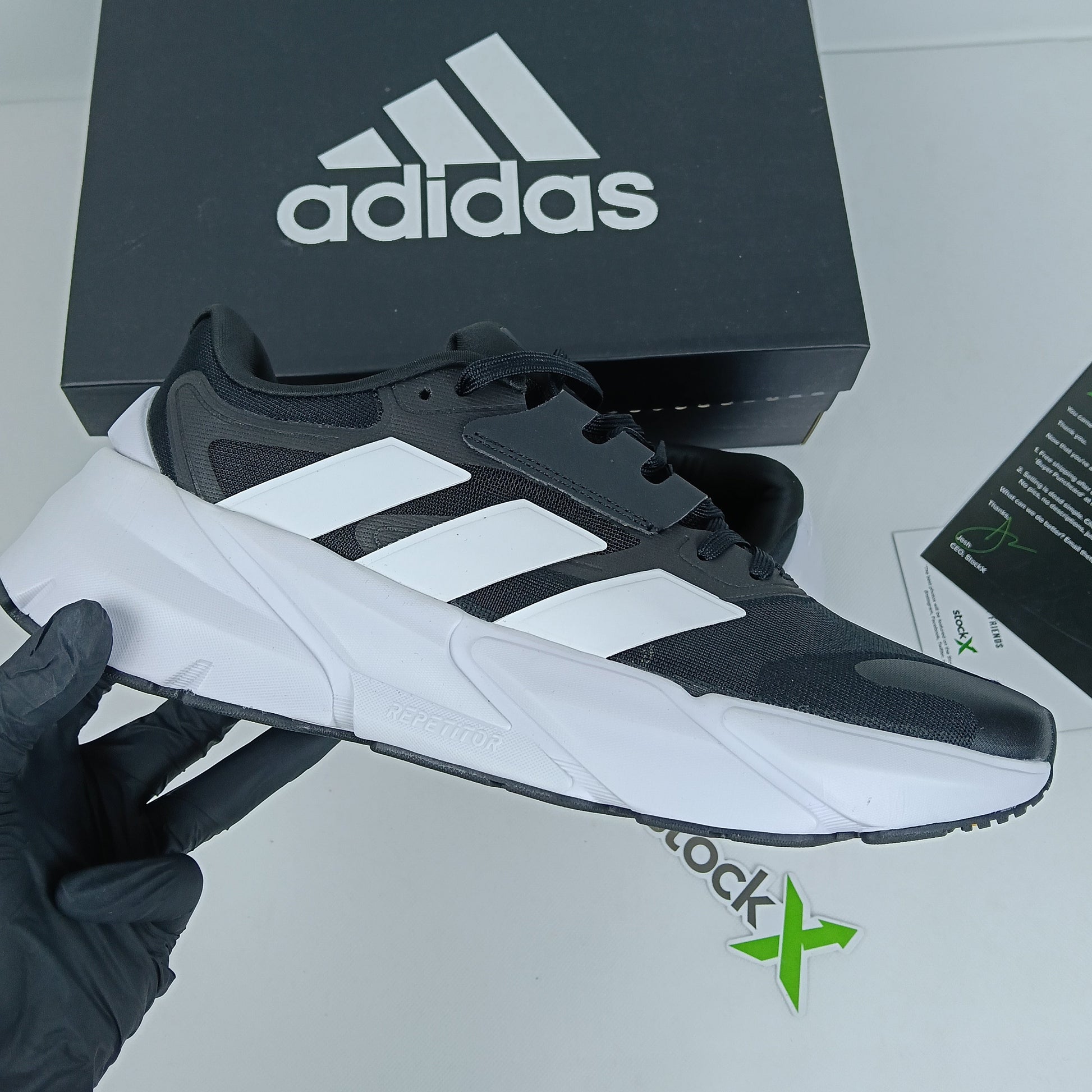 Black and white Adidas sneaker 